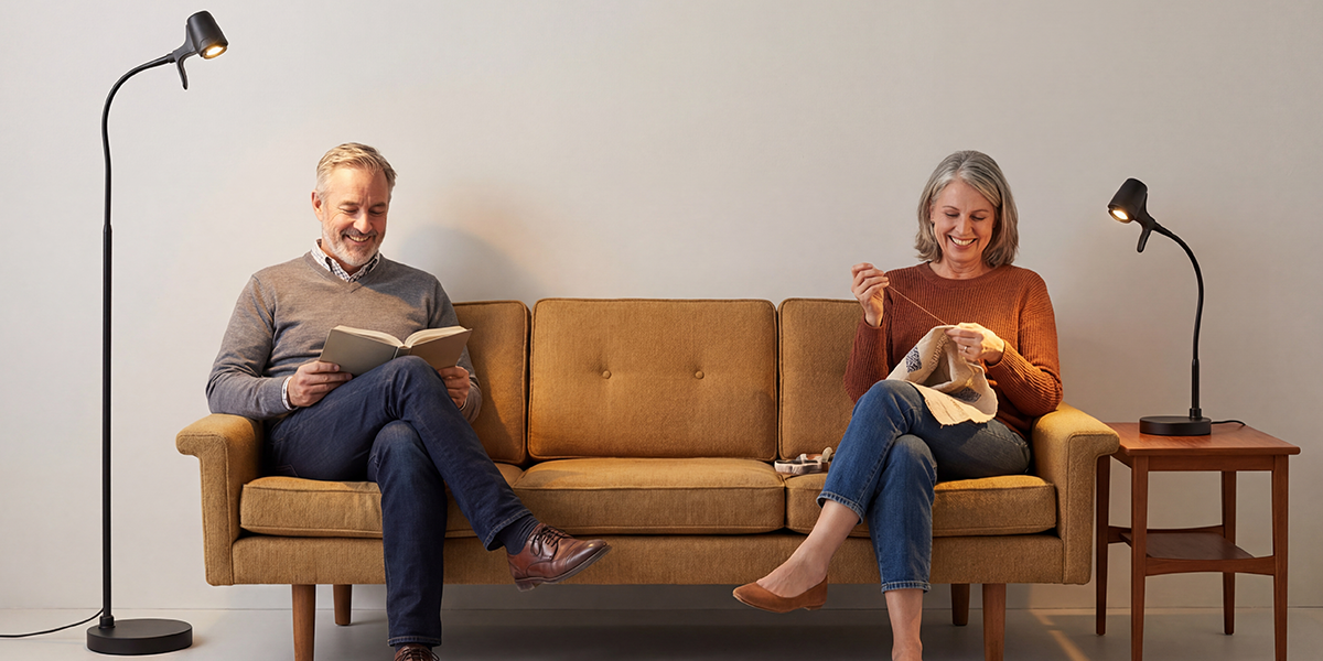 The HD Pro Floor Light beside a reading chair