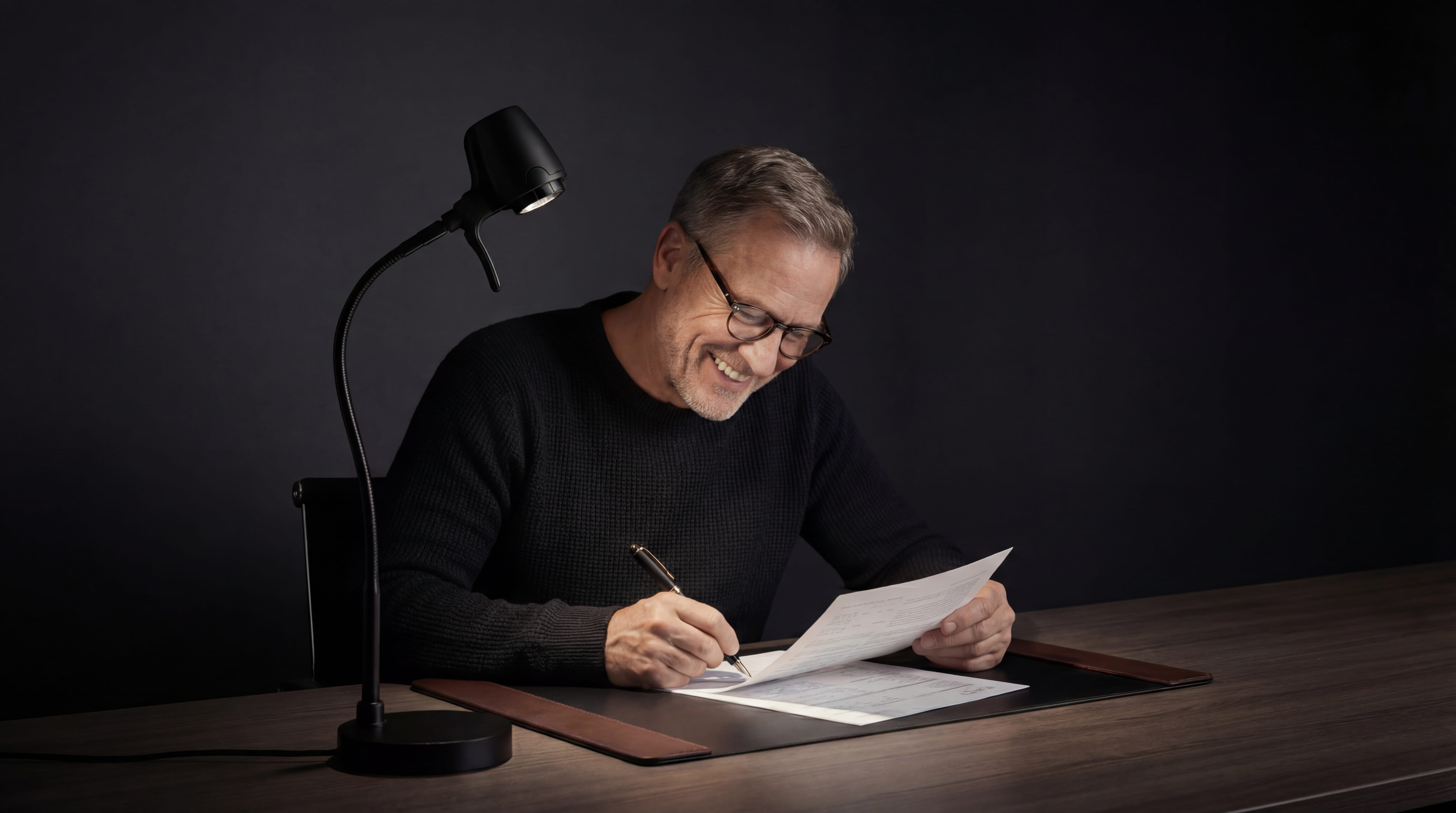 Serious Readers reading light over an open hardback book