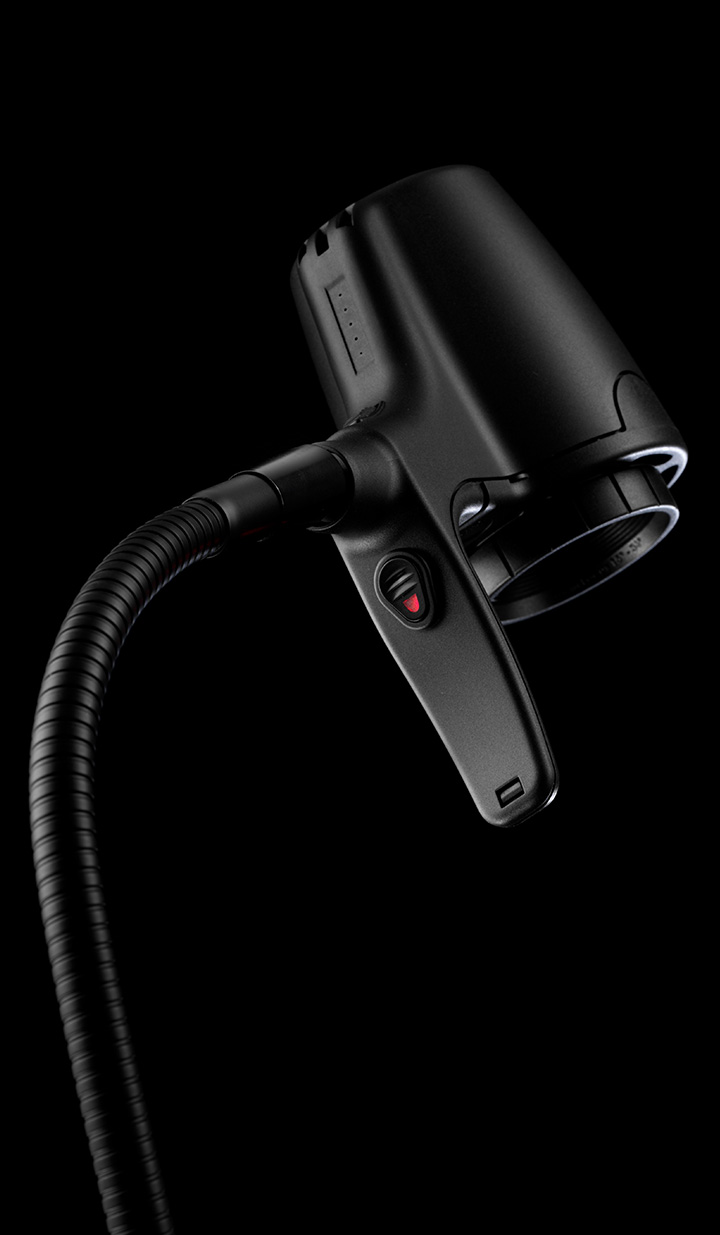 Bedside reading light directed at book without disturbing partner