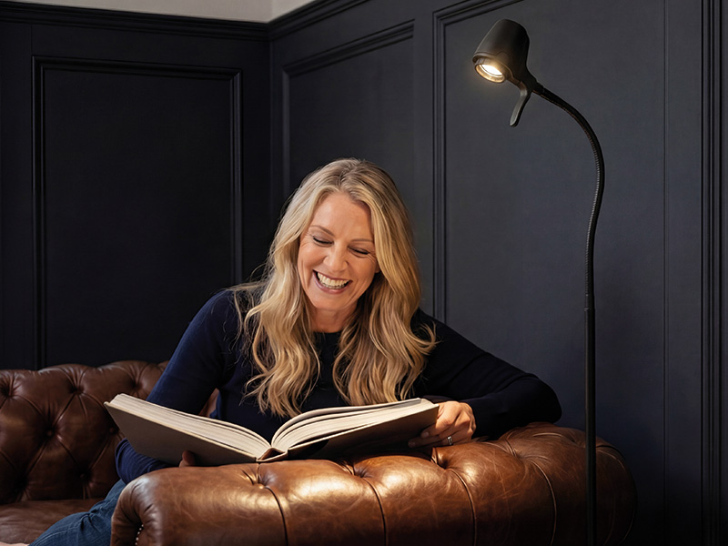 Living room scene: evening reading by armchair